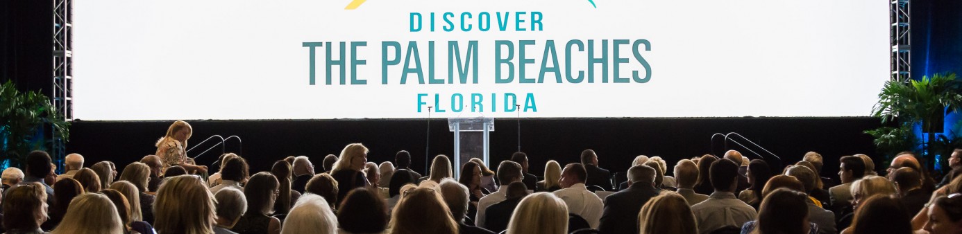 Photo of large wide screen with Discover the Palm Beaches logo