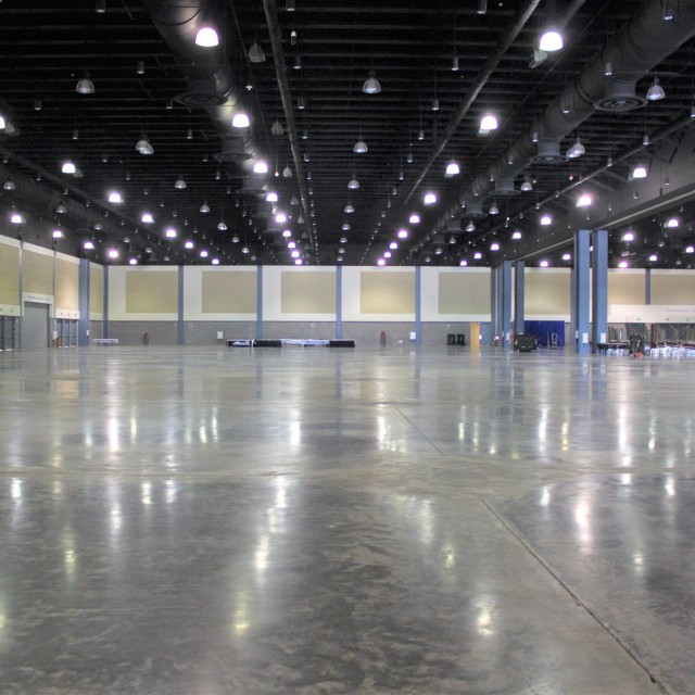 Empty Exhibit Hall A with concrete floor